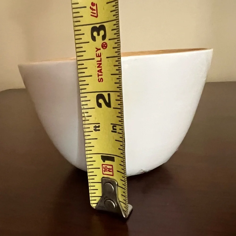2 bowls never used. Can use for nuts, jewelry or anything. One white, one blue.